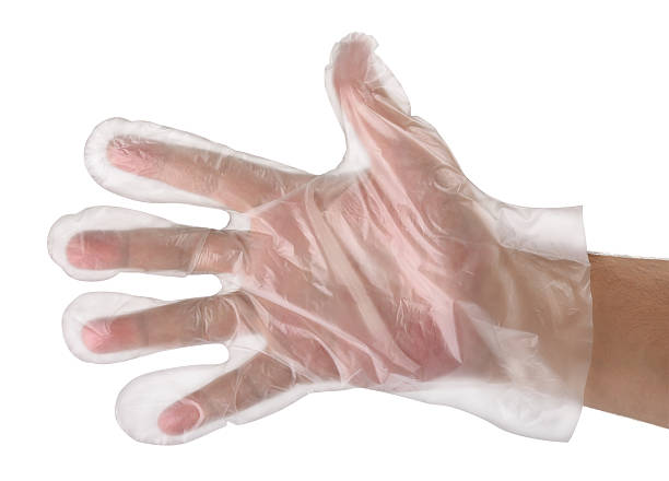 Man hand wearing disposable plastic glove
